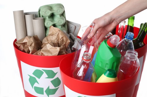 Workers sorting recyclable materials at a Central London facility